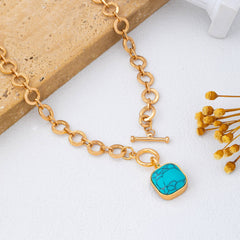 Turquoise-Tone Medallion Toggle Necklace | 80N93042